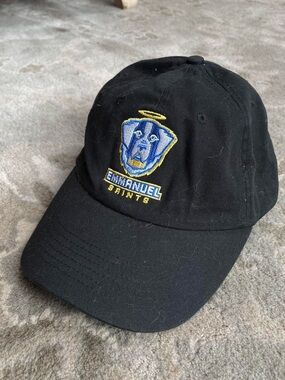 Emmanuel Saints Black Baseball Cap with Blue & Yellow Logo